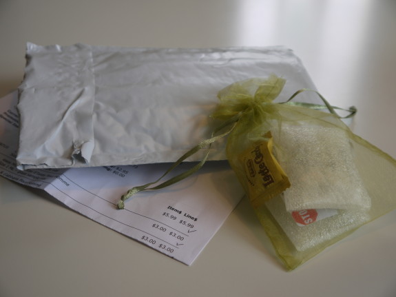 Inside the bubble envelope: a bag of goodies and a packing slip.