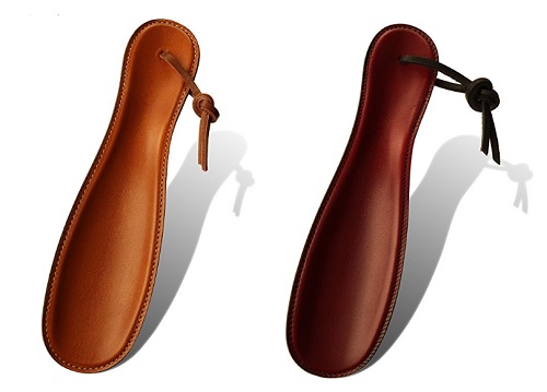 A portable, packable leather shoe horn