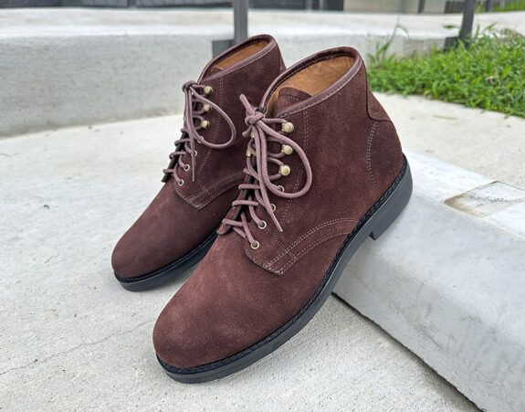 J. Crew Field Boots in Brown Suede leaning on curb